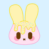 drawing of pink bunny face with yellow frosting and sprinkles on ears